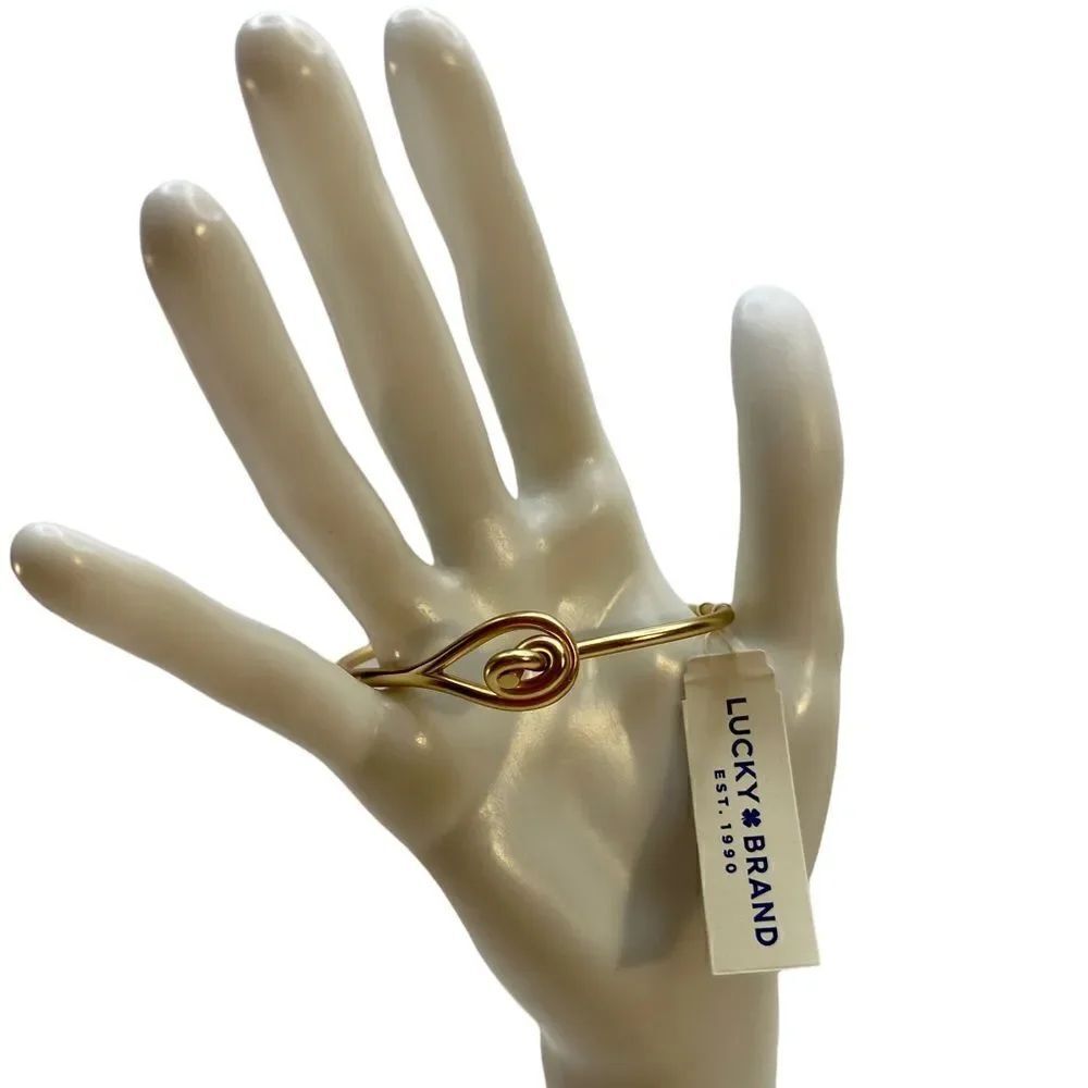 Lucky Brand Gold Toned Love Knot Bracelet.